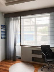 Design of curtains for a window with a balcony in the living room