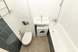 Photo of the design of a bathroom combined room in a panel house