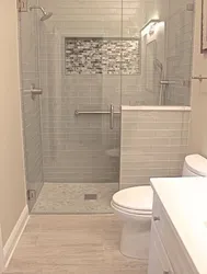 Small bathroom design with shower and washing machine sink