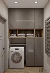 Bathroom cabinet above the washing machine photo
