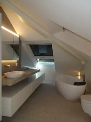 Bathroom ceiling in the attic photo