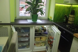 Kitchen design with refrigerator and freezer