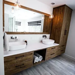 Bath design with wood furniture