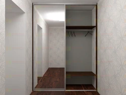 Built-in wardrobe in a niche in the hallway photo