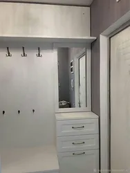 Built-in wardrobe in a niche in the hallway photo