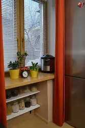 Refrigerator design under the window in the kitchen in Khrushchev photo