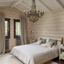 Дизайн спальни дома из бревен