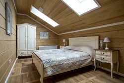 Дизайн спальни дома из бревен