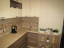 Corner kitchen design with a box in the corner