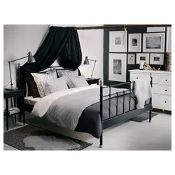 Black bed in the bedroom interior photo