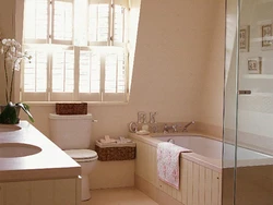 Photo Of A Bathroom With A Bathtub In The Middle