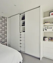 Built-in wardrobe in the bedroom interior photo