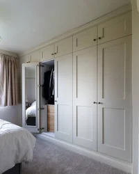 Built-in wardrobe in the bedroom interior photo