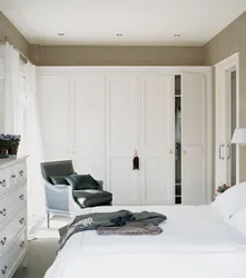 Built-in wardrobe in the bedroom interior photo