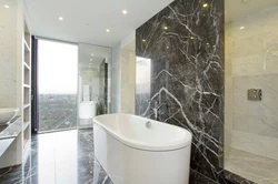 Porcelain tiles for floors and walls in the bathroom photo