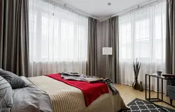 Bedroom design with two windows on one side