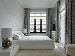 Bedroom with two windows on one wall interior