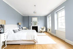 Bedroom with white floor photo