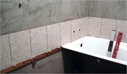 Photo of how to lay tiles in the bathroom