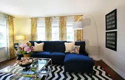 Curtains In The Color Of The Sofa In The Living Room Interior