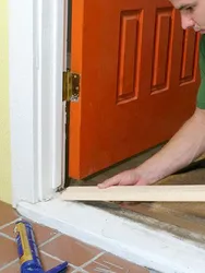 Installing a bathroom door photo