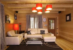 Living room design in a wooden house made of timber photo