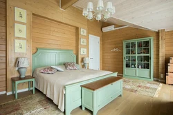 Bedroom in a wooden house made of timber photo