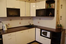 Modern Kitchen With Dark Countertop Photo