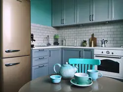 What color goes with gray-blue in the kitchen interior