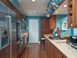 What color goes with gray-blue in the kitchen interior