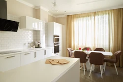 White Kitchens In The Interior With Beige Wallpaper