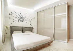 Photo Of A Bedroom In An Apartment With A Wardrobe