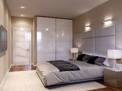 Photo of a bedroom in an apartment with a wardrobe