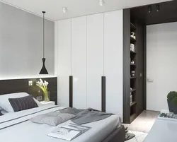 Photo of a bedroom in an apartment with a wardrobe
