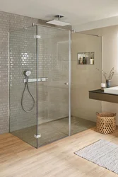 Photo Of A Bathtub With A Rain Shower