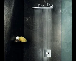 Photo of a bathtub with a rain shower