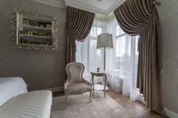 Velvet curtains in the interior of a living room in style