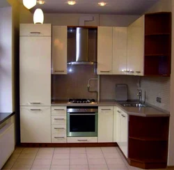 Corner kitchens with pencil case and refrigerator photo