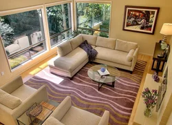 Carpet In The Living Room Interior With A Corner Sofa