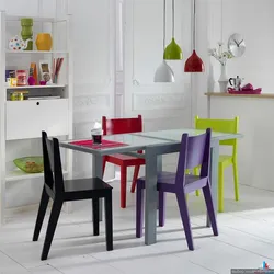 Chairs Of Different Colors In The Kitchen Interior