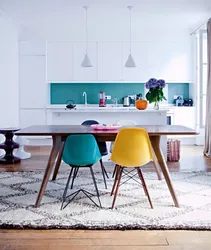 Chairs Of Different Colors In The Kitchen Interior