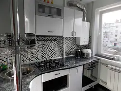 Kitchens in Khrushchev with a gas water heater and a refrigerator photo