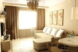 Living room design with beige furniture