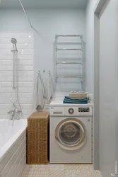 Placing a washing machine in the bathtub photo