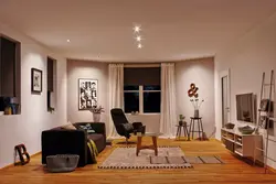 Встроенные светильники в интерьере гостиной