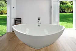 Freestanding bathtub in the bathroom interior