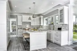 Gray floor and gray walls in the kitchen interior