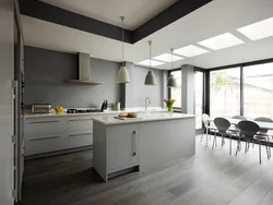 Gray floor and gray walls in the kitchen interior