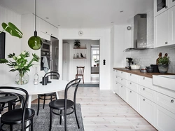 Gray floor and gray walls in the kitchen interior