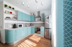 Photo of small blue kitchen